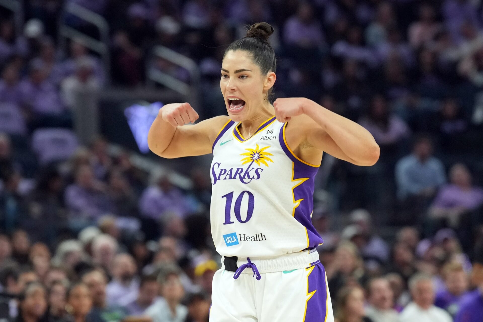 May 16, 2025; San Francisco, California, USA; Los Angeles Sparks guard Kelsey Plum (10) gestures after a basket by forward Rickea Jackson (not shown) during the second quarter against the Golden State Valkyries at Chase Center.