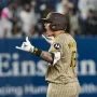 May 5, 2025; Bronx, New York, USA; San Diego Padres third baseman Manny Machado (13) reacts after hitting a two RBI double against the New York Yankees during the eighth inning at Yankee Stadium.