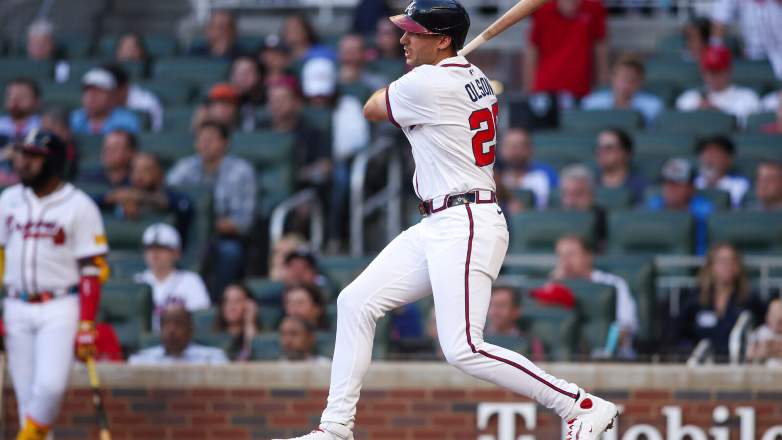 May 12, 2025; Atlanta, Georgia, USA; Atlanta Braves first baseman Matt Olson (28) hits a single against the Washington Nationals in the third inning at Truist Park.