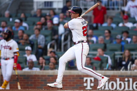 May 12, 2025; Atlanta, Georgia, USA; Atlanta Braves first baseman Matt Olson (28) hits a single against the Washington Nationals in the third inning at Truist Park.