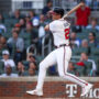 May 12, 2025; Atlanta, Georgia, USA; Atlanta Braves first baseman Matt Olson (28) hits a single against the Washington Nationals in the third inning at Truist Park.