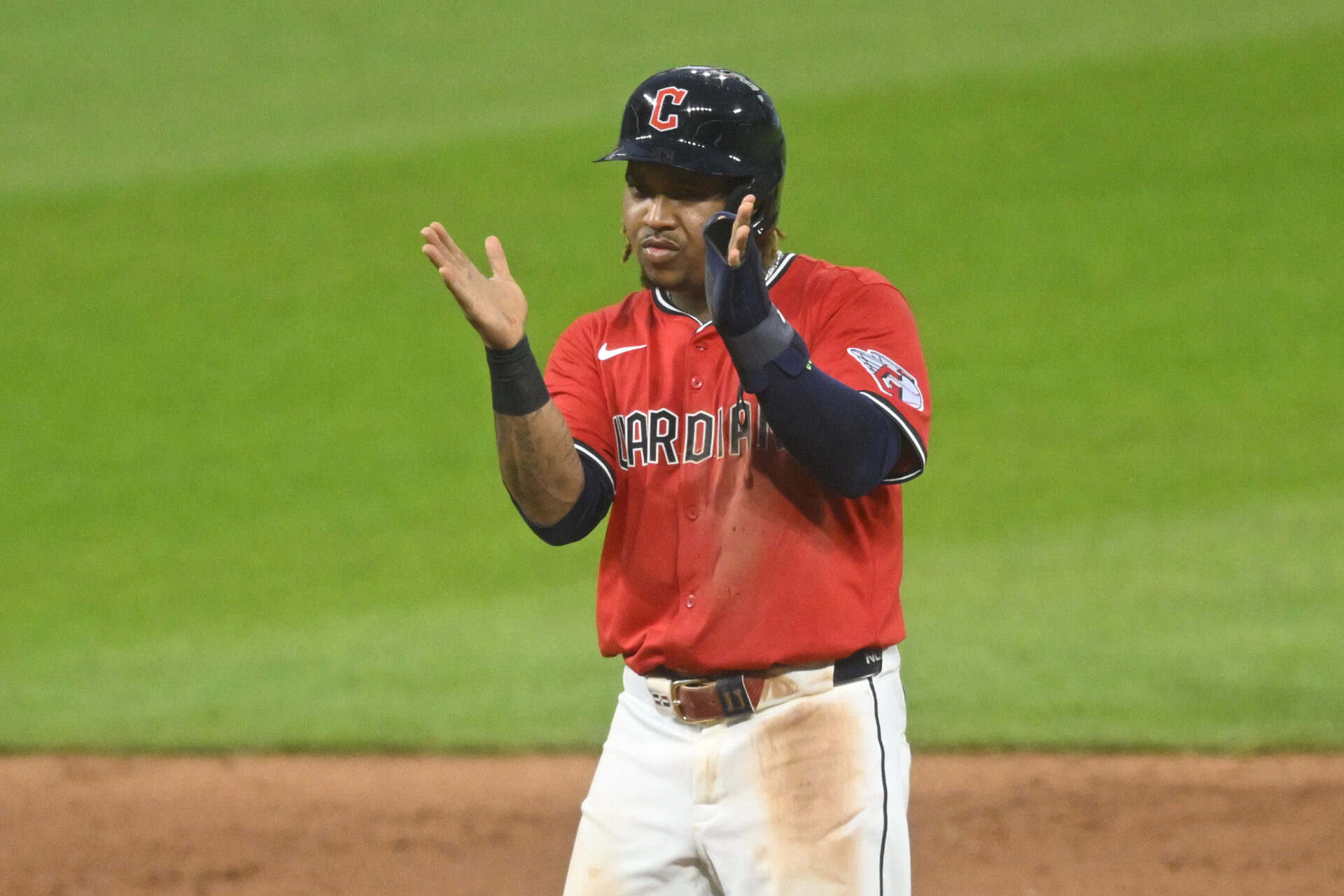 May 12, 2025; Cleveland, Ohio, USA; Cleveland Guardians third baseman Jose Ramirez (11) reacts while standing on second base in the seventh inning against the Milwaukee Brewers at Progressive Field.