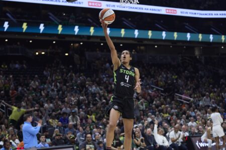 May 30, 2025; Seattle, Washington, USA; Seattle Storm guard Skylar Diggins (4) goes to the basket against the Atlanta Dream during the first half at Climate Pledge Arena.