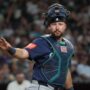 Jun 9, 2025; Phoenix, Arizona, USA; Seattle Mariners catcher Cal Raleigh (29) looks for a sign against the Arizona Diamondbacks in the fifth inning at Chase Field.
