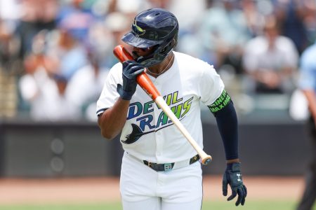 Jun 21, 2025; Tampa, Florida, USA; Tampa Bay Rays third baseman Junior Caminero (13) hits a home run against the Detroit Tigers in the fourth inning at George M. Steinbrenner Field.