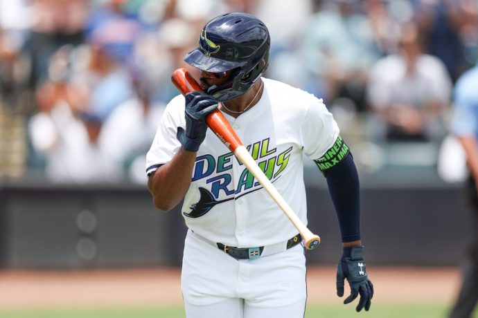 Jun 21, 2025; Tampa, Florida, USA; Tampa Bay Rays third baseman Junior Caminero (13) hits a home run against the Detroit Tigers in the fourth inning at George M. Steinbrenner Field.