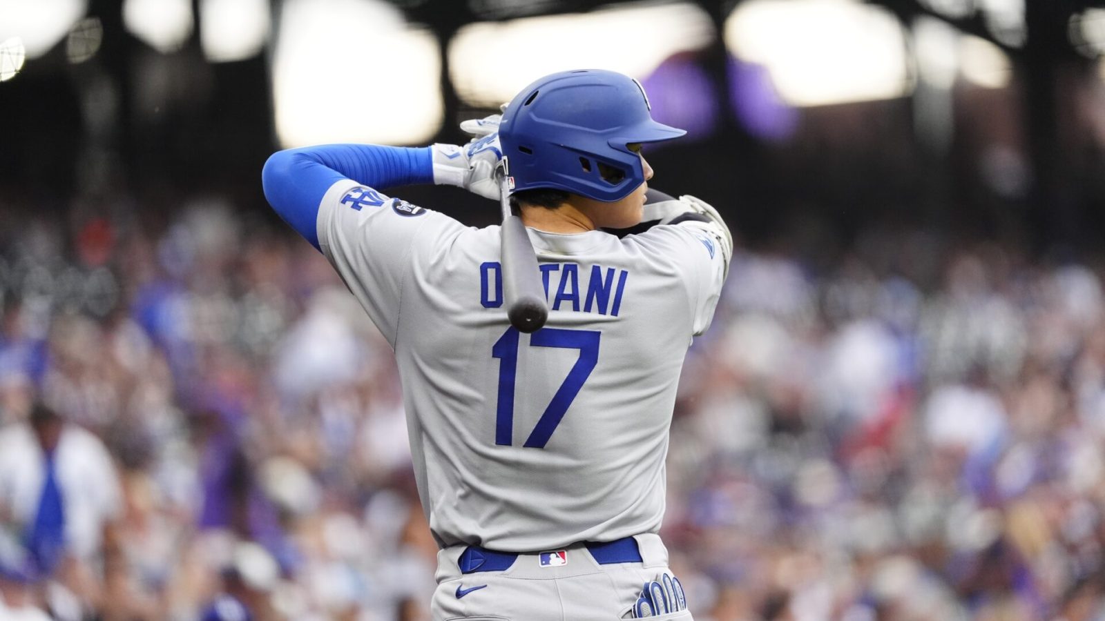 Jun 24, 2025; Denver, Colorado, USA; Los Angeles Dodgers designated hitter Shohei Ohtani (17) warms up during the first inning against the Colorado Rockies at Coors Field.