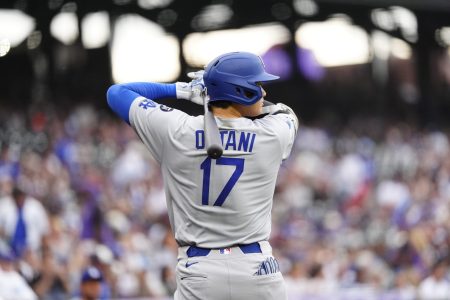 Jun 24, 2025; Denver, Colorado, USA; Los Angeles Dodgers designated hitter Shohei Ohtani (17) warms up during the first inning against the Colorado Rockies at Coors Field.