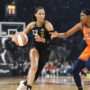 Sep 11, 2022; Las Vegas, Nevada, USA; Las Vegas Aces forward Aja Wilson (22) drives the ball against Connecticut Sun forward Jonquel Jones (35) in the first quarter during game one of the 2022 WNBA Finals at Michelob Ultra Arena.