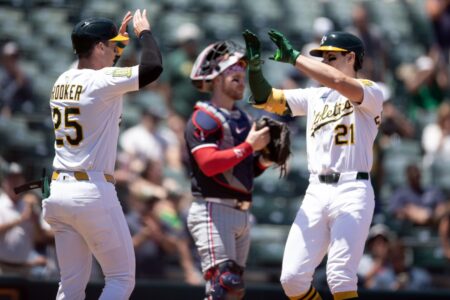 Jun 5, 2025; West Sacramento, California, USA; Athletics left fielder Brent Rooker (25) greets teammate Tyler Soderstrom (21) after his two-run home run against the Minnesota Twins during the third inning at Sutter Health Park.