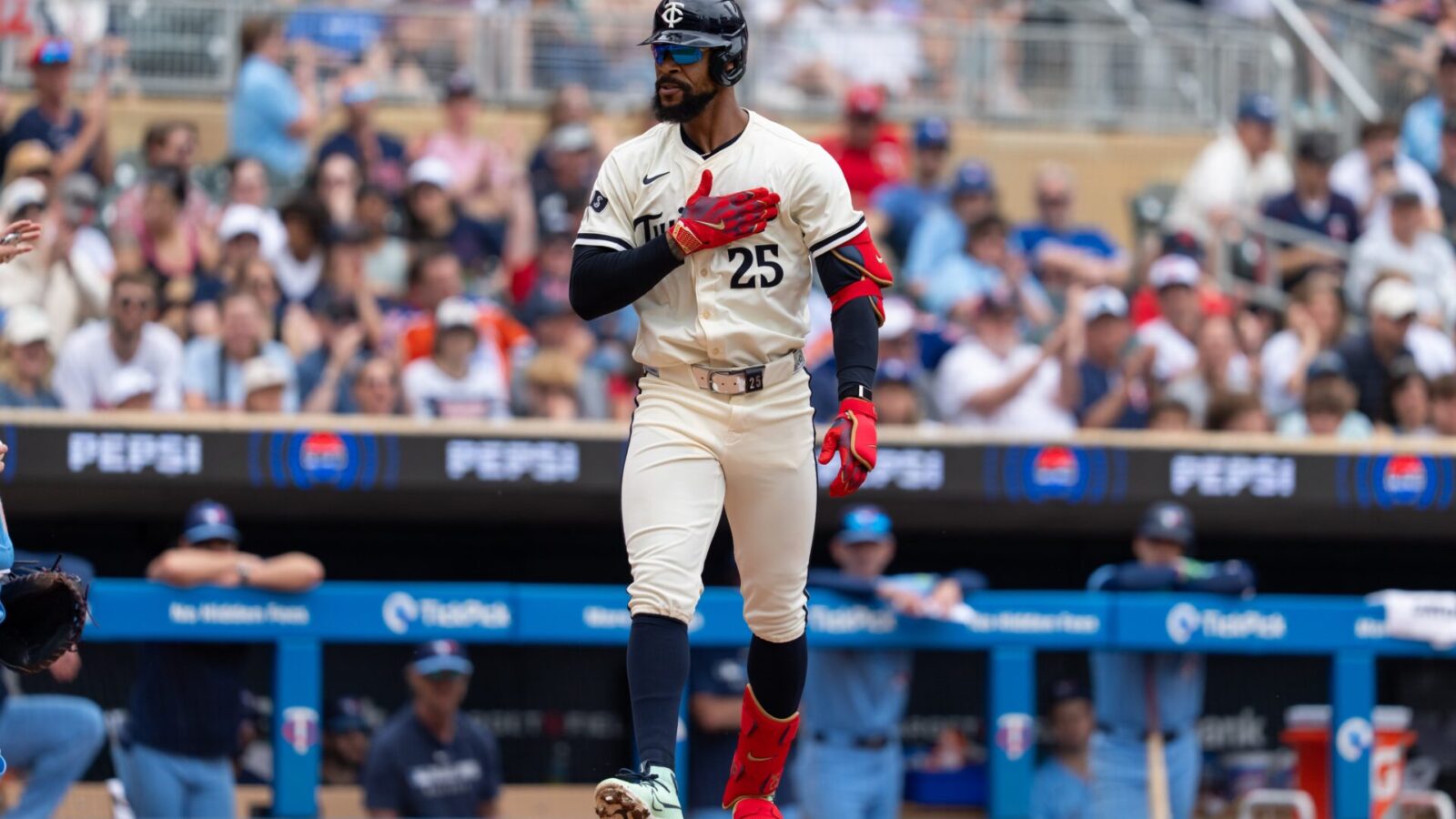 Jun 8, 2025; Minneapolis, Minnesota, USA; Minnesota Twins center fielder Byron Buxton (25) reacts to getting walked during the fifth inning against the Toronto Blue Jays at Target Field.
