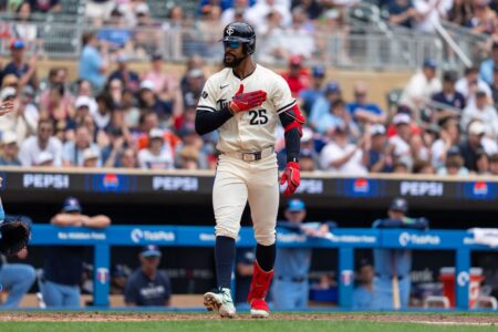 Jun 8, 2025; Minneapolis, Minnesota, USA; Minnesota Twins center fielder Byron Buxton (25) reacts to getting walked during the fifth inning against the Toronto Blue Jays at Target Field.