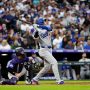Jun 24, 2025; Denver, Colorado, USA; Los Angeles Dodgers two-way player Shohei Ohtani (17) hits a two run home run in the sixth inning against the Colorado Rockies at Coors Field.