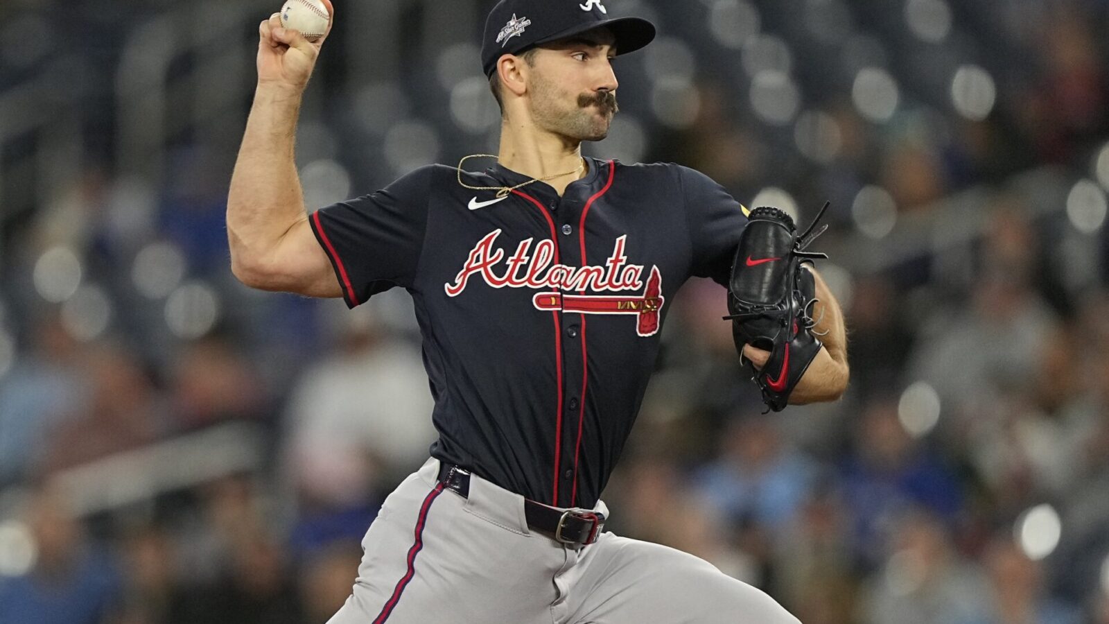 Apr 16, 2025; Toronto, Ontario, CAN; Atlanta Braves starting pitcher Spencer Strider (99) pitches to the Toronto Blue Jays during the first inning at Rogers Centre.
