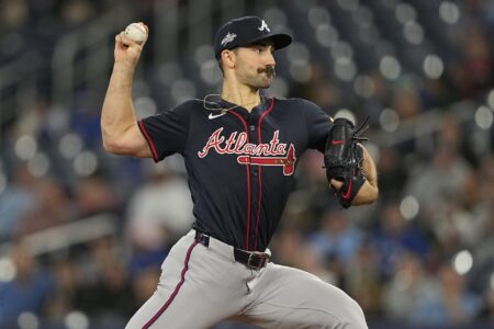 Apr 16, 2025; Toronto, Ontario, CAN; Atlanta Braves starting pitcher Spencer Strider (99) pitches to the Toronto Blue Jays during the first inning at Rogers Centre.