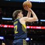 Mar 27, 2025; Washington, District of Columbia, USA; Indiana Pacers forward Johnny Furphy (12) shoots during the second half against the Washington Wizards at Capital One Arena.