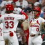 Jul 8, 2025; St. Louis, Missouri, USA; St. Louis Cardinals left fielder Brendan Donovan (33) celebrates with shortstop Masyn Winn (0) after hitting a two run home run against the Washington Nationals during the third inning at Busch Stadium.