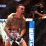 Apr 13, 2024; Las Vegas, Nevada, USA; Max Holloway (blue gloves) reacts after defeating Justin Gaethje (not pictured) during UFC 300 at T-Mobile Arena. Holloway is one of our best UFC props for this weekend.