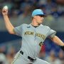 Jul 4, 2025; Miami, Florida, USA; Milwaukee Brewers starting pitcher Quinn Priester (46) delivers a pitch against the Miami Marlins during the first inning at loanDepot Park.