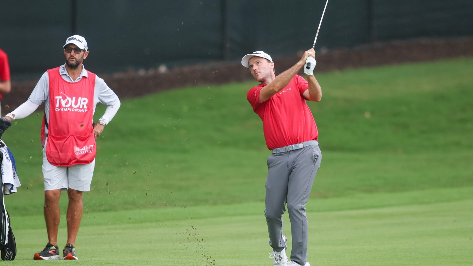 Aug 23, 2025; Atlanta, Georgia, USA; Russell Henley takes a shot on the 12th hole during the third round of the TOUR Championship golf tournament.