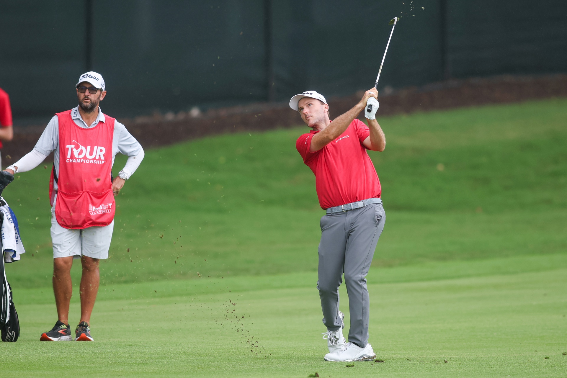 Aug 23, 2025; Atlanta, Georgia, USA; Russell Henley takes a shot on the 12th hole during the third round of the TOUR Championship golf tournament.