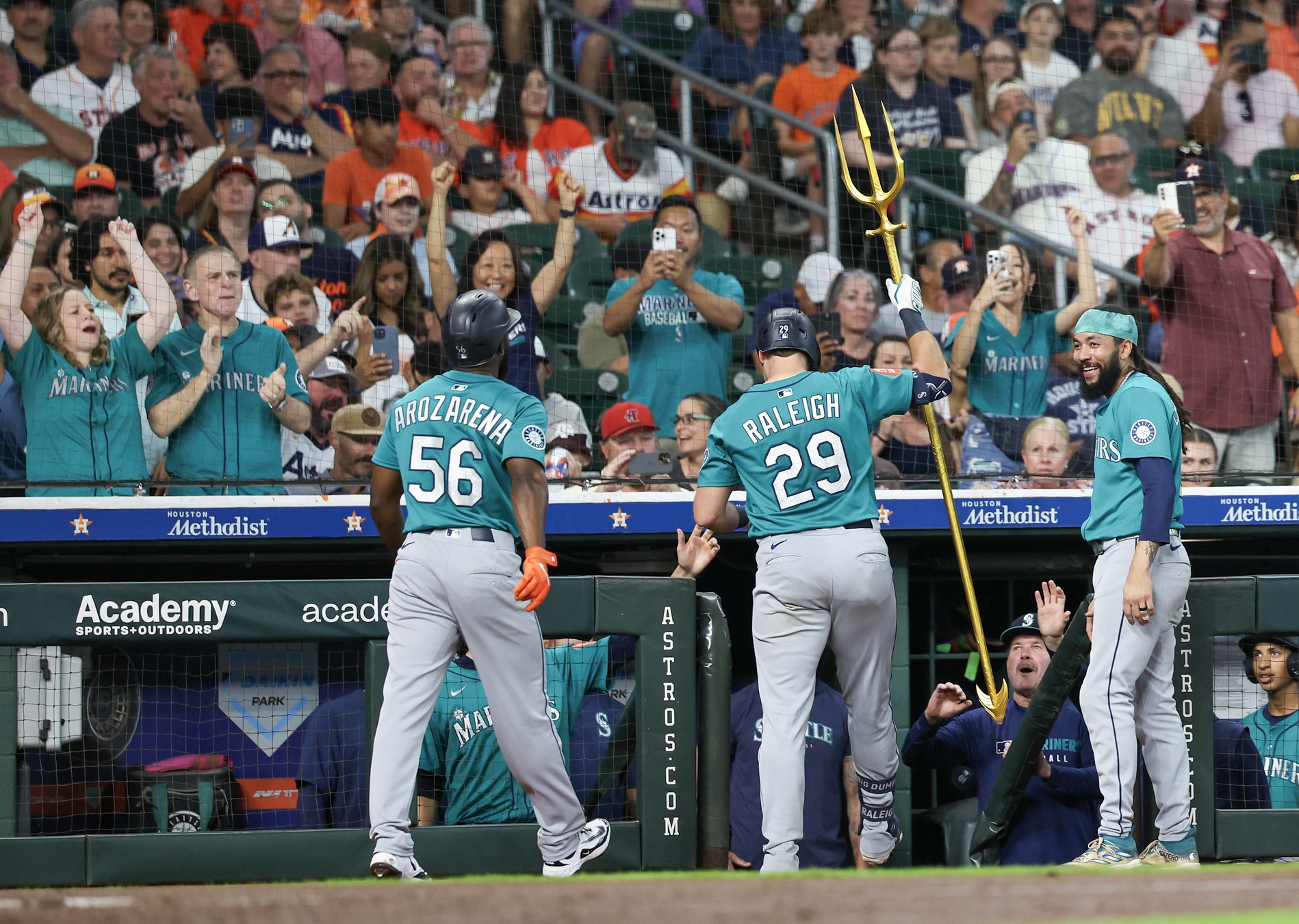 Sep 21, 2025; Houston, Texas, USA; Seattle Mariners catcher Cal Raleigh (29) raises the trident after hitting a two-run home run against the Houston Astros in the second inning at Daikin Park.