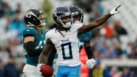 Dec 29, 2024; Jacksonville, Florida, USA; Tennessee Titans wide receiver Calvin Ridley (0) signals for first down against the Jacksonville Jaguars during the third quarter at EverBank Stadium.