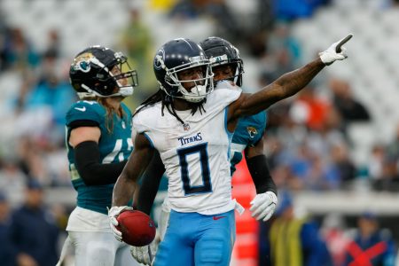Dec 29, 2024; Jacksonville, Florida, USA; Tennessee Titans wide receiver Calvin Ridley (0) signals for first down against the Jacksonville Jaguars during the third quarter at EverBank Stadium.