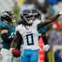 Dec 29, 2024; Jacksonville, Florida, USA; Tennessee Titans wide receiver Calvin Ridley (0) signals for first down against the Jacksonville Jaguars during the third quarter at EverBank Stadium.