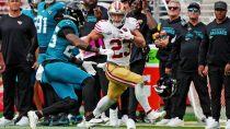 San Francisco 49ers running back Christian McCaffrey (23) runs after a catch against Jacksonville Jaguars linebacker Yasir Abdullah (56) during the second half at Levi's Stadium.