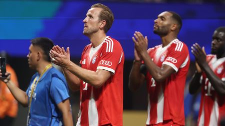 Jul 5, 2025; Atlanta, Georgia, USA; FC Bayern Munich forward Harry Kane (9) and defender Jonathan Tah (4) react a quarterfinal match of the 2025 FIFA Club World Cup against Paris Saint-Germain at Mercedes-Benz Stadium.