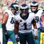 Sep 21, 2025; Philadelphia, Pennsylvania, USA; Philadelphia Eagles quarterback Jalen Hurts (1) reacts after a touchdown pass to wide receiver Devonta Smith (not pictured) during the fourth quarter against the Los Angeles Rams at Lincoln Financial Field.