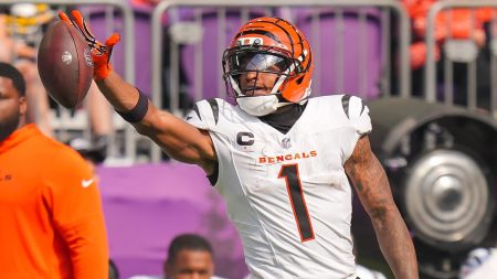 Sep 21, 2025; Minneapolis, Minnesota, USA; Cincinnati Bengals wide receiver Ja'Marr Chase (1) reacts after making a catch against the Minnesota Vikings during the second half at U.S. Bank Stadium.