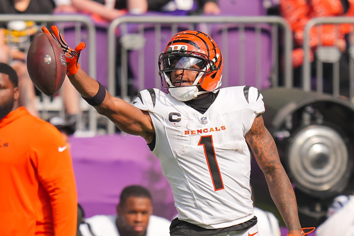 Sep 21, 2025; Minneapolis, Minnesota, USA; Cincinnati Bengals wide receiver Ja'Marr Chase (1) reacts after making a catch against the Minnesota Vikings during the second half at U.S. Bank Stadium.