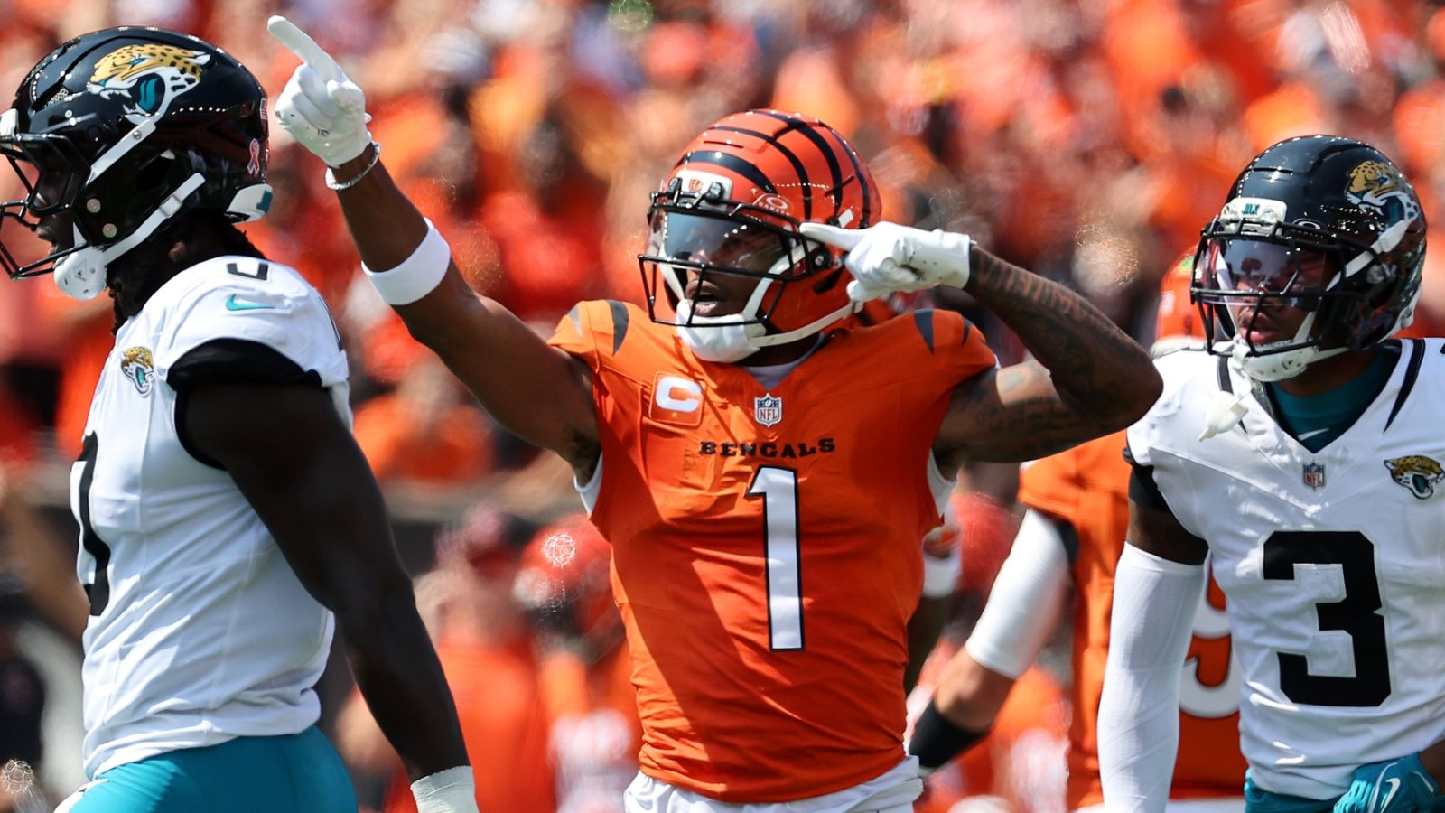 Sep 14, 2025; Cincinnati, Ohio, USA; Cincinnati Bengals wide receiver Ja'Marr Chase (1) celebrates the first down catch during the first quarter against the Jacksonville Jaguars at Paycor Stadium.