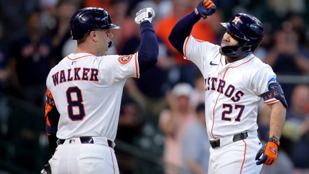 Aug 28, 2025; Houston, Texas, USA; Houston Astros designated hitter Jose Altuve (27) is congratulated by first baseman Christian Walker (8) after hitting a solo home run against the Colorado Rockies during the first inning at Daikin Park.