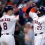 Aug 28, 2025; Houston, Texas, USA; Houston Astros designated hitter Jose Altuve (27) is congratulated by first baseman Christian Walker (8) after hitting a solo home run against the Colorado Rockies during the first inning at Daikin Park.