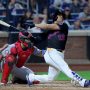 New York Mets right fielder Juan Soto (22) follows through on a three run home run against the Washington Nationals during the fourth inning at Citi Field.