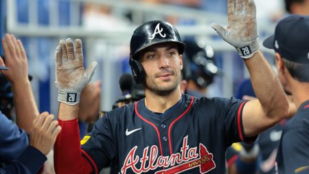 Aug 27, 2025; Miami, Florida, USA; Atlanta Braves first baseman Matt Olson (28) celebrates after hitting a home run against the Miami Marlins during the third inning at loanDepot Park.