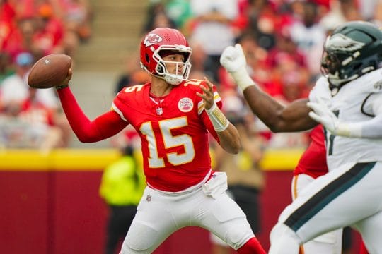 Sep 14, 2025; Kansas City, Missouri, USA; Kansas City Chiefs quarterback Patrick Mahomes (15) throws a pass during the first half against the Philadelphia Eagles at GEHA Field at Arrowhead Stadium.