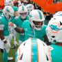 Miami Dolphins quarterback Tua Tagovailoa (1) talks to his teammates before the game against the San Francisco 49ers at Hard Rock Stadium.