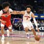 Oct 16, 2025; Detroit, Michigan, USA; Detroit Pistons guard Cade Cunningham (2) drives past Washington Wizards forward Kyshawn George (18) in the first quarter at Little Caesars Arena.