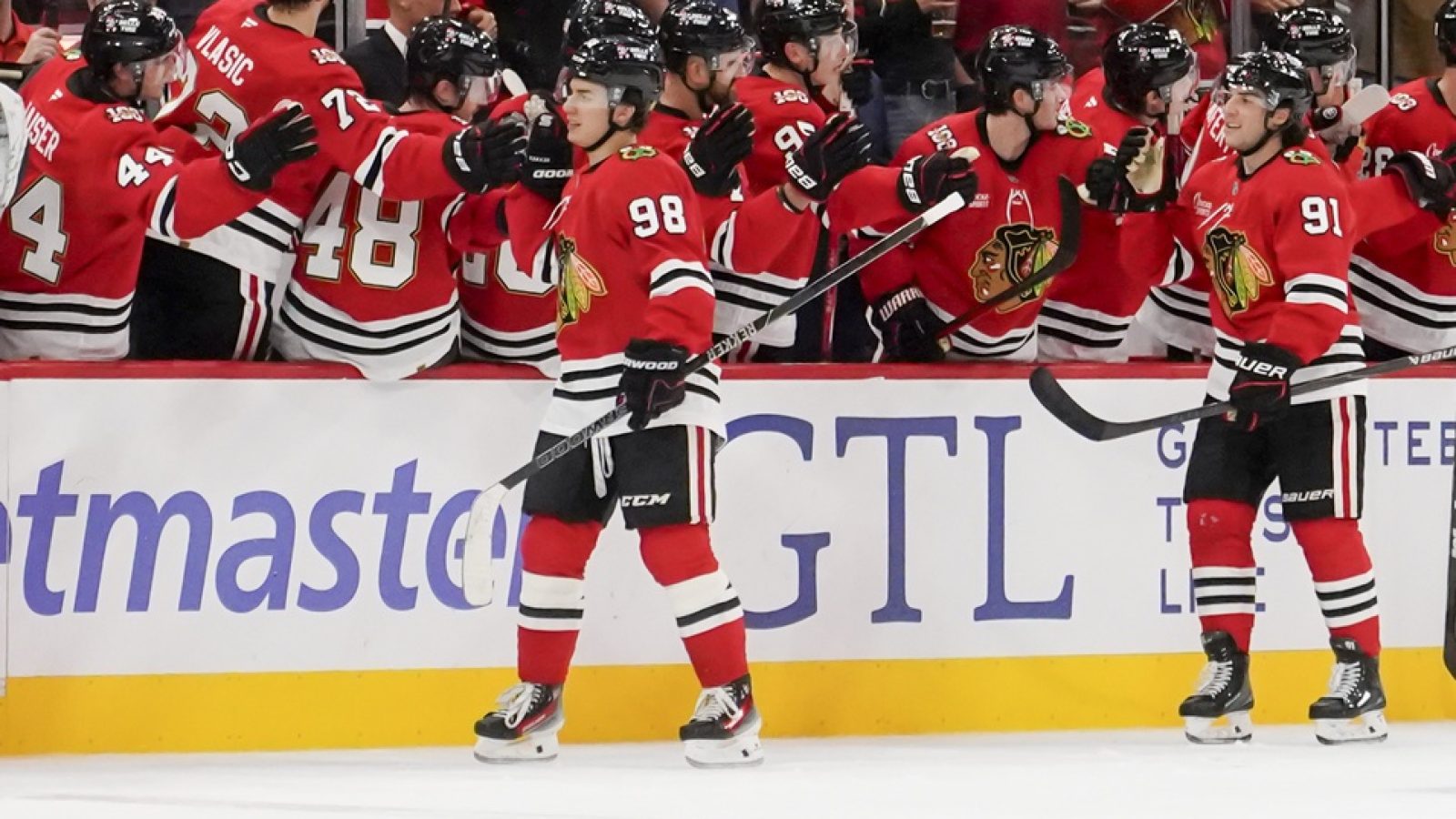Oct 11, 2025; Chicago, Illinois, USA; Chicago Blackhawks center Connor Bedard (98) celebrates his goal against the Montréal Canadiens during the second period at United Center.