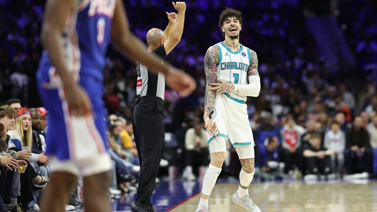 Oct 25, 2025; Philadelphia, Pennsylvania, USA; Charlotte Hornets guard LaMelo Ball (1) reacts to his three pointer against the Philadelphia 76ers during the third quarter at Xfinity Mobile Arena.