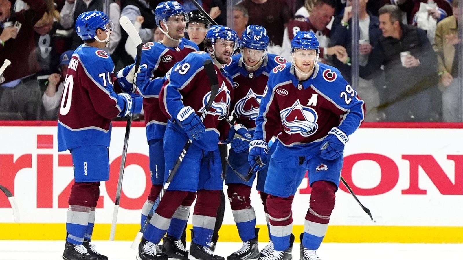 May 1, 2025; Denver, Colorado, USA; Colorado Avalanche center Nathan MacKinnon (29) celebrates his go ahead goal with defenseman Samuel Girard (49), left wing Artturi Lehkonen (62),center Martin Necas (88) and defenseman Sam Malinski (70) in the third period against the Dallas Stars against the Dallas Stars in game six of the first round of the 2025 Stanley Cup Playoffs at Ball Arena.