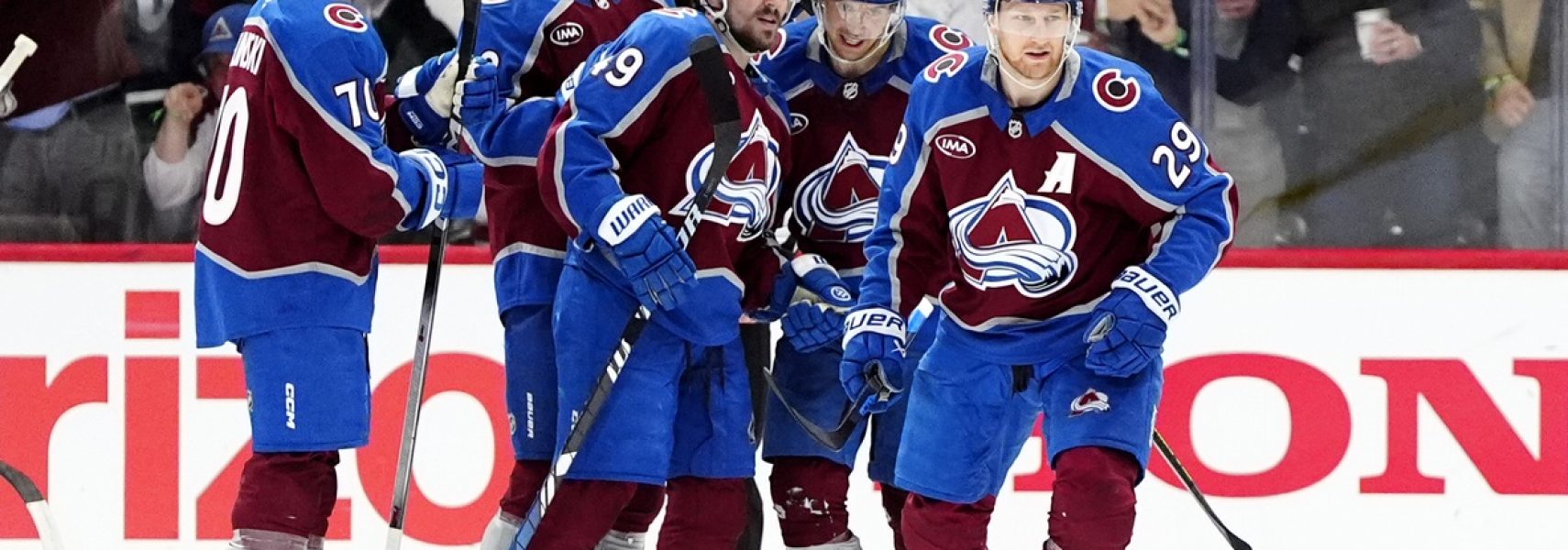 May 1, 2025; Denver, Colorado, USA; Colorado Avalanche center Nathan MacKinnon (29) celebrates his go ahead goal with defenseman Samuel Girard (49), left wing Artturi Lehkonen (62),center Martin Necas (88) and defenseman Sam Malinski (70) in the third period against the Dallas Stars against the Dallas Stars in game six of the first round of the 2025 Stanley Cup Playoffs at Ball Arena.