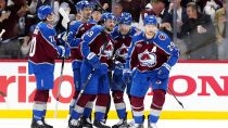 May 1, 2025; Denver, Colorado, USA; Colorado Avalanche center Nathan MacKinnon (29) celebrates his go ahead goal with defenseman Samuel Girard (49), left wing Artturi Lehkonen (62),center Martin Necas (88) and defenseman Sam Malinski (70) in the third period against the Dallas Stars against the Dallas Stars in game six of the first round of the 2025 Stanley Cup Playoffs at Ball Arena.