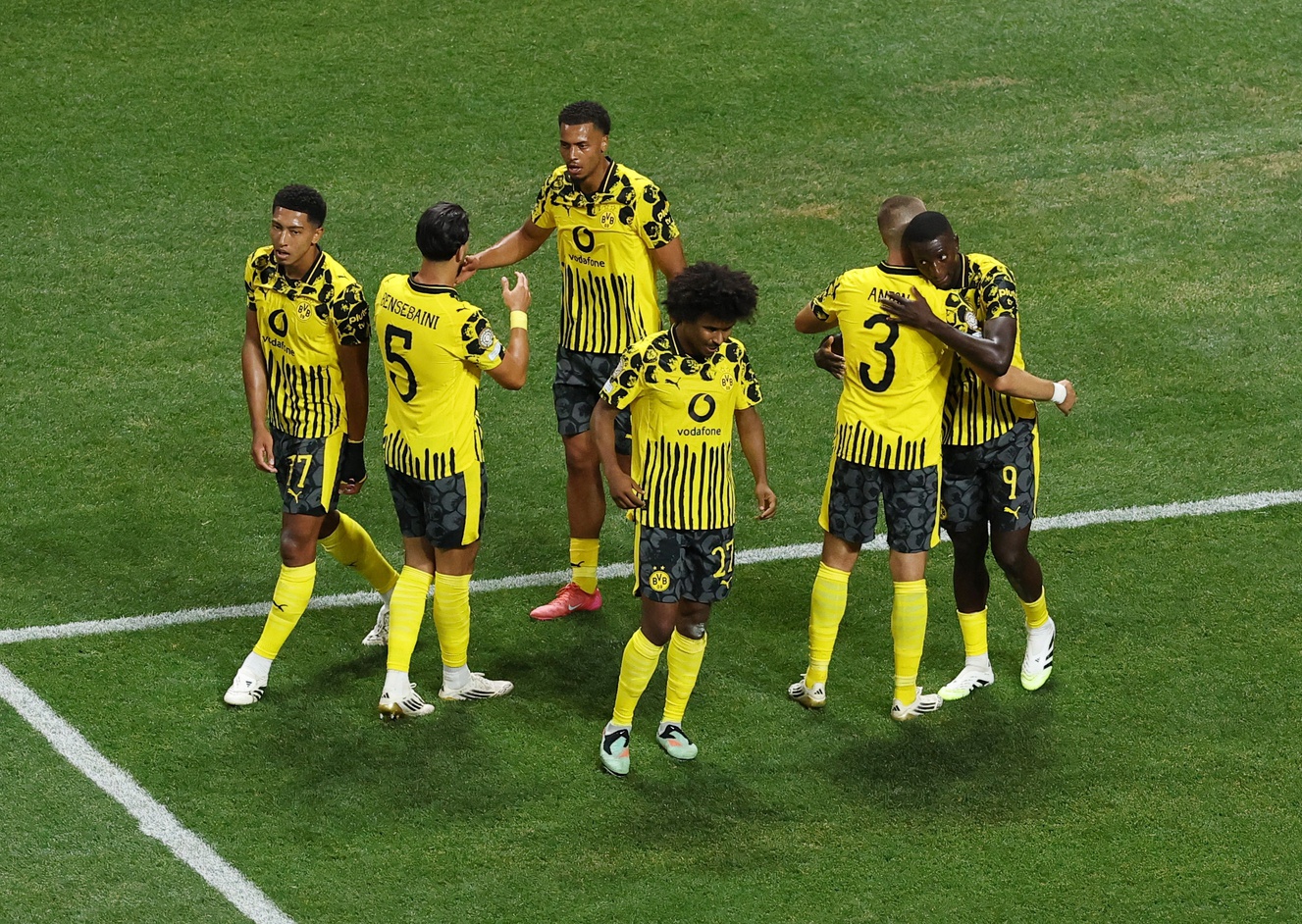 Borussia Dortmund forward Serhou Guirassy (9) celebrates scoring their second goal with teammates during a round of 16 match of the 2025 FIFA Club World Cup at Mercedes-Benz Stadium.