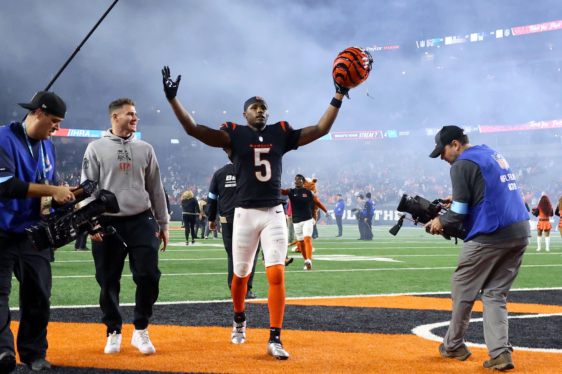 Dec 28, 2024; Cincinnati, Ohio, USA; Cincinnati Bengals wide receiver Tee Higgins (5) celebrates following the overtime win against the Denver Broncos at Paycor Stadium.