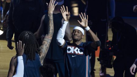 Nov 19, 2025; Oklahoma City, Oklahoma, USA; Oklahoma City Thunder guard Shai Gilgeous-Alexander (2) high fives his team during introductions before the start of a game against Sacramento Kings during the first quarter at Paycom Center.